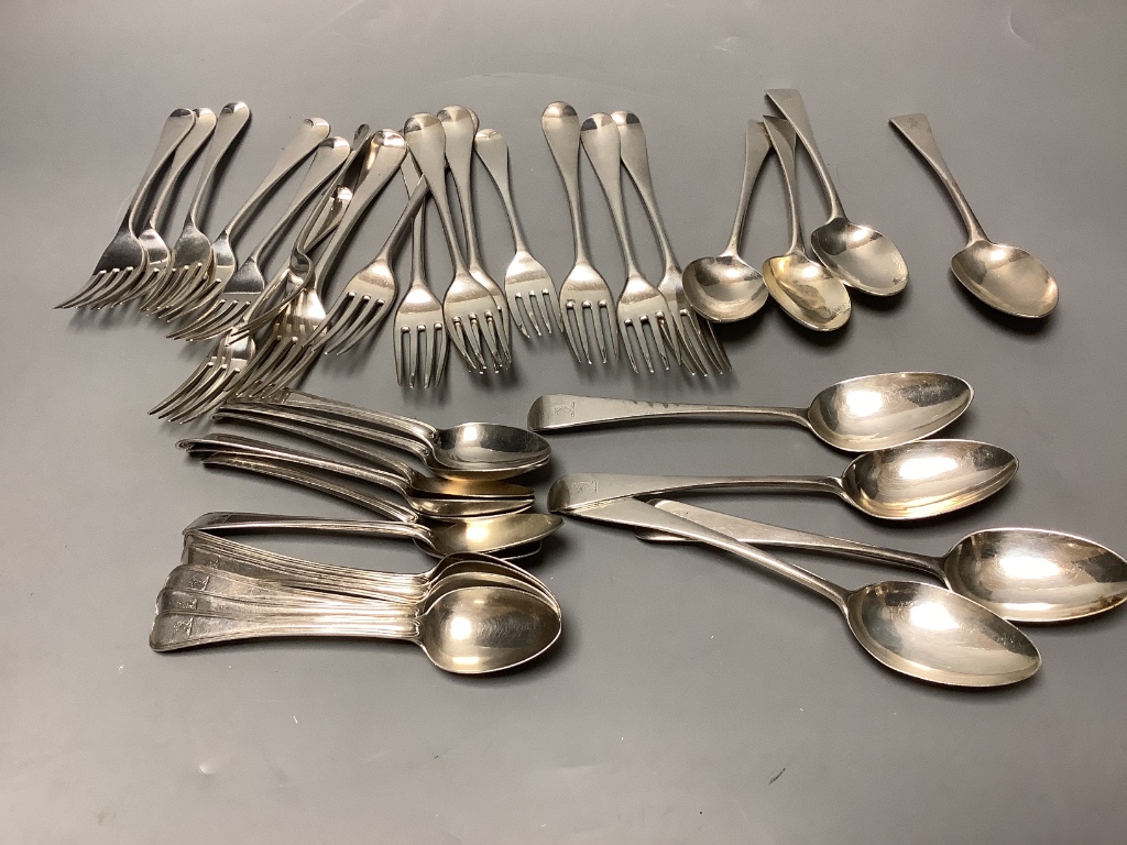 Thirty six items of 18th & 19th century silver Old English, Old English thread and Hanovarian flatware, various dates and makers (worn tines)